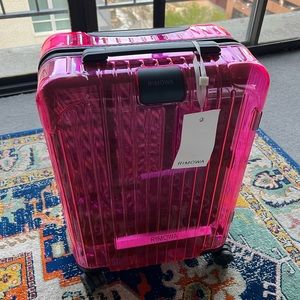 Rimowa Clear Neon Carry On